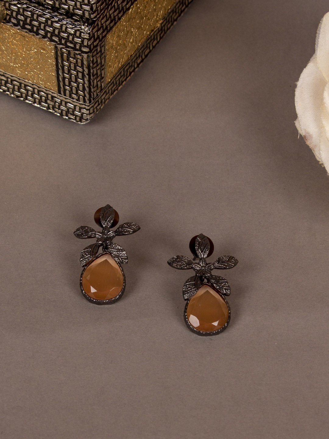 

AccessHer Black & Brown Teardrop Shaped Studs Earrings