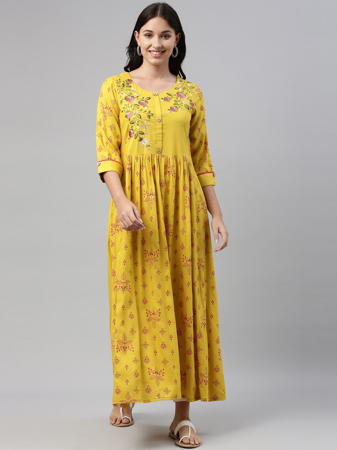 

Neerus Women Mustard Yellow & Pink Floral Printed Thread Work Anarkali Kurta