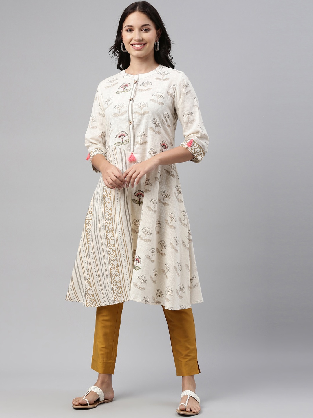 

Neerus Women Cream-Coloured & Beige Ethnic Motifs Kurta