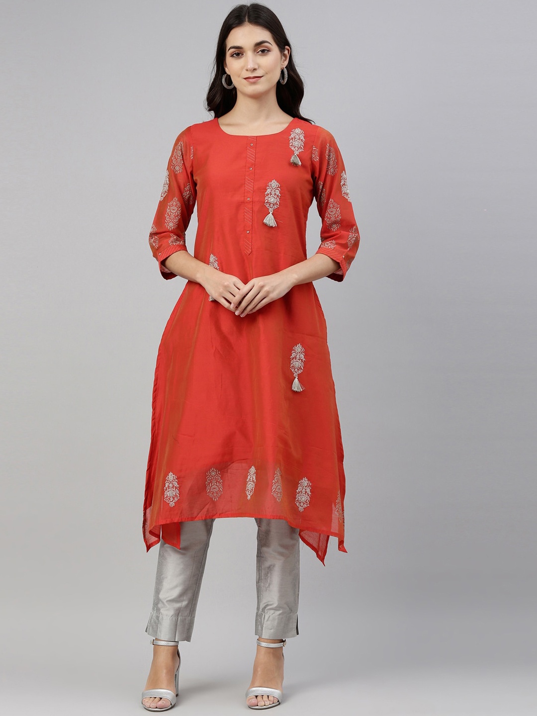

Neerus Women Orange & Silver-Toned Ethnic Motifs Thread Work Kurta
