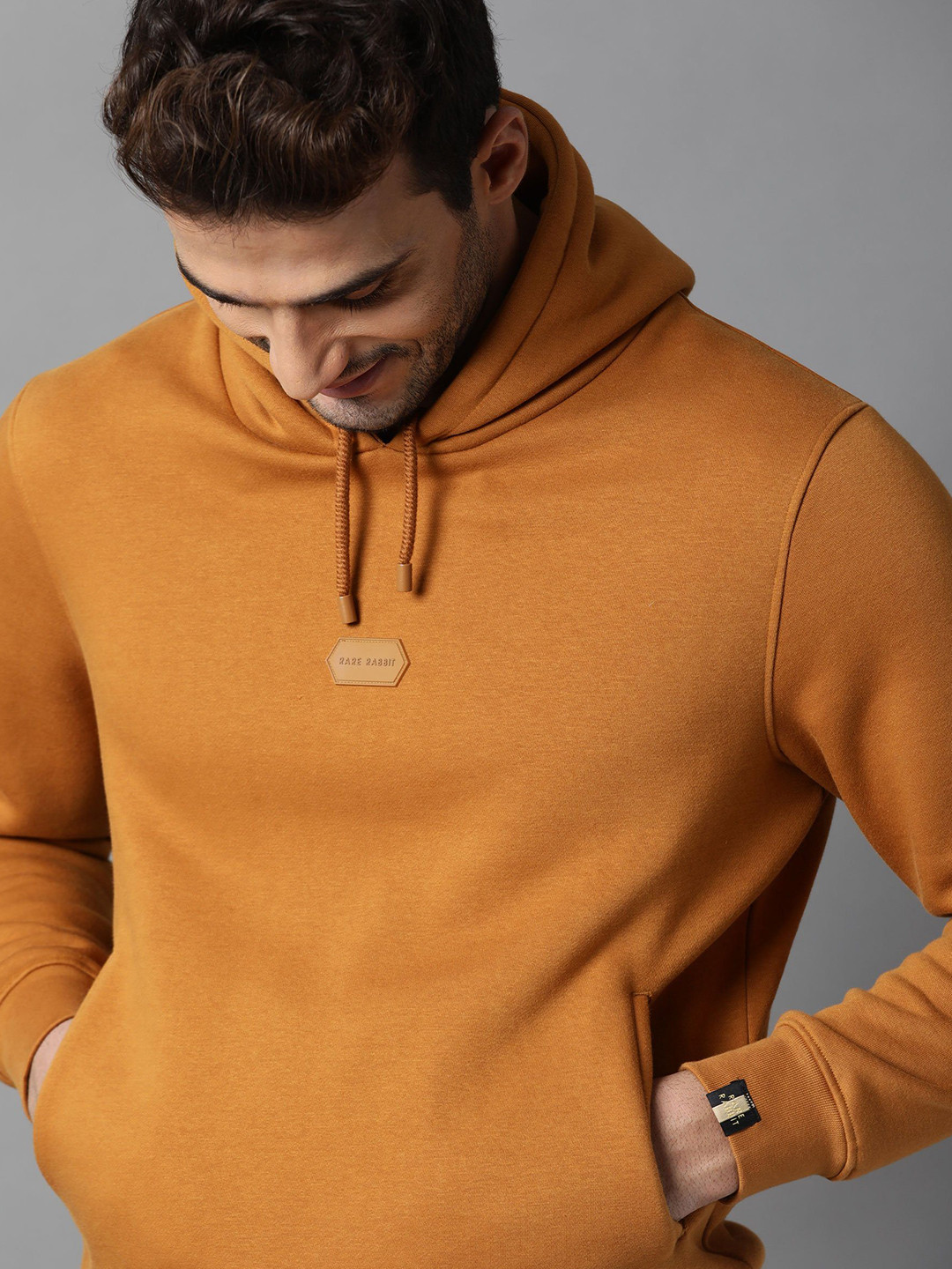 

RARE RABBIT Men Rust Hooded Sweatshirt