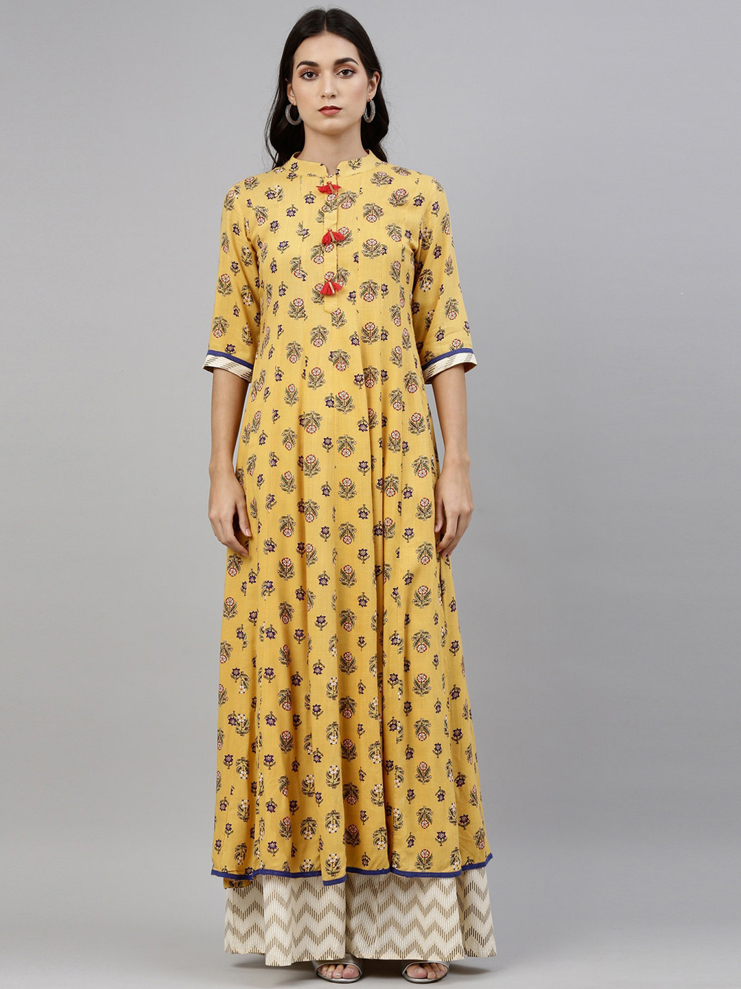 

Neerus Women Yellow Printed Kurta with Skirt