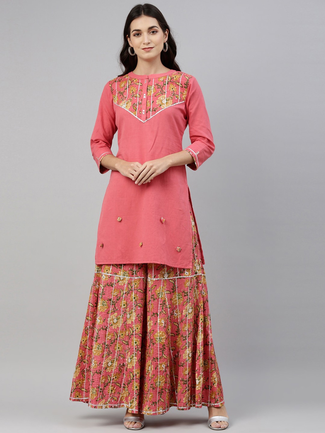 

Neerus Women Coral Floral Yoke Design Kurta with Sharara