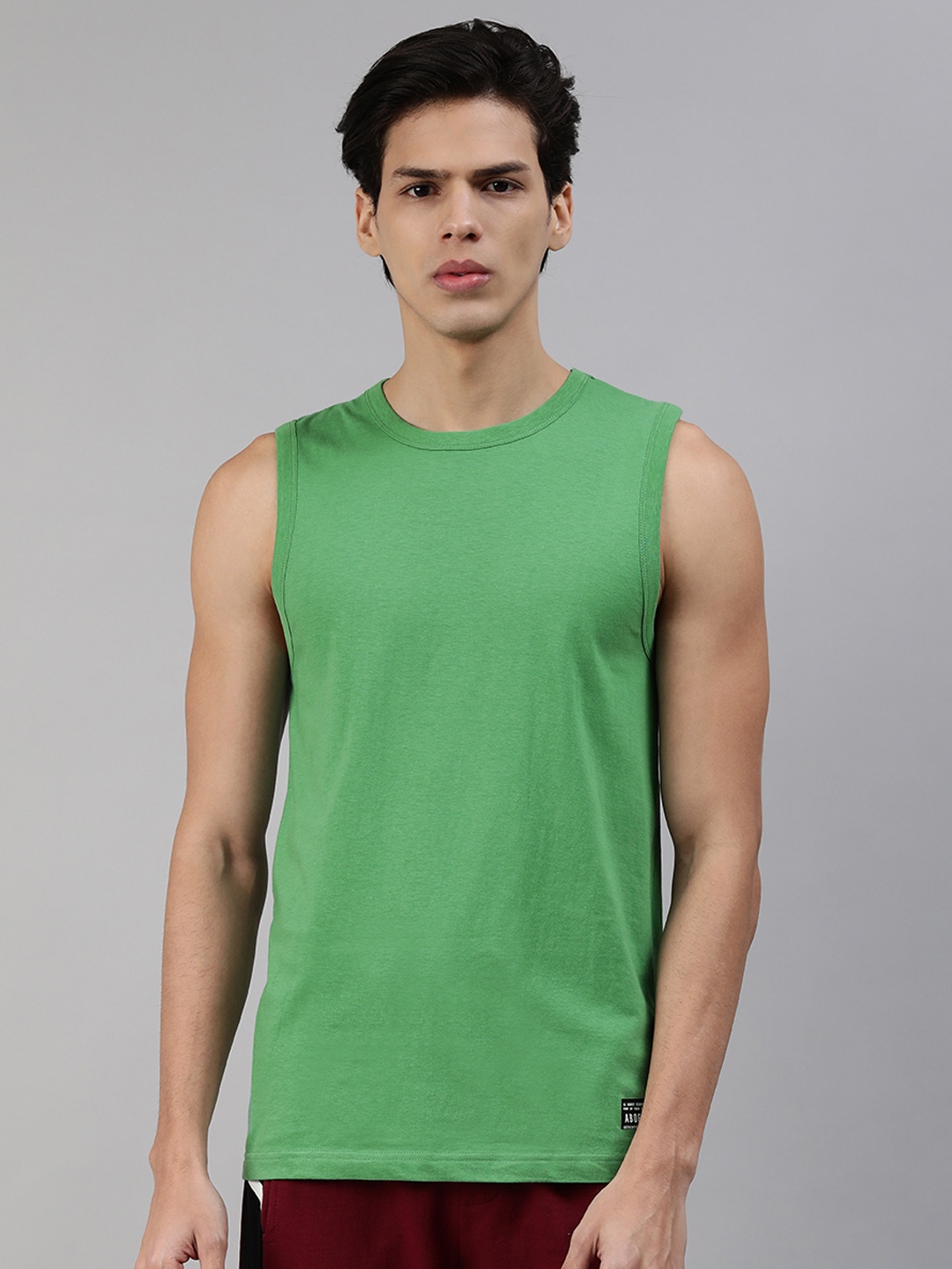 

abof Men Green Solid Sleeveless Pure Cotton T-shirt