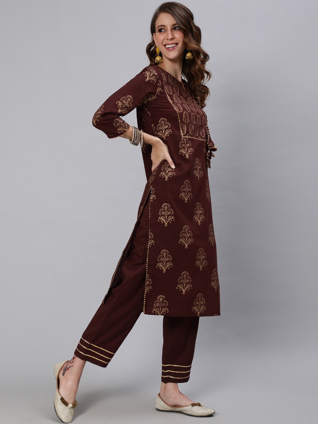 

Ishin Women Brown Ethnic Motifs Printed Pure Cotton Kurta with Trousers