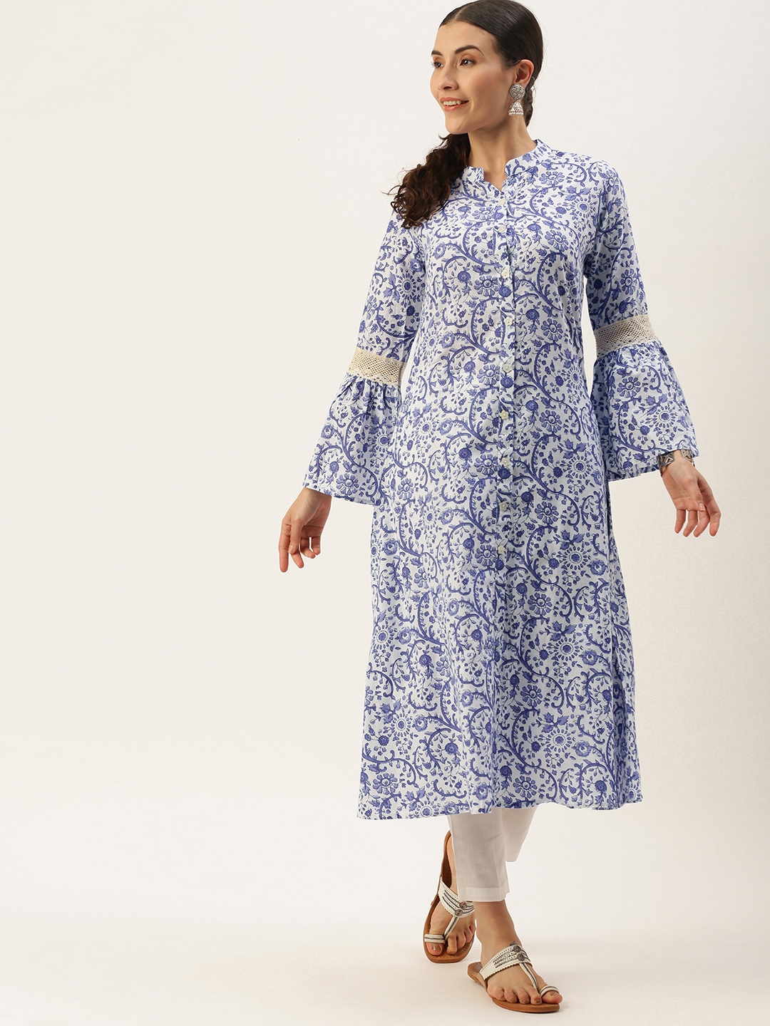 

Saanjh Women White Floral Printed Regular Pure Cotton Kurta with Palazzos