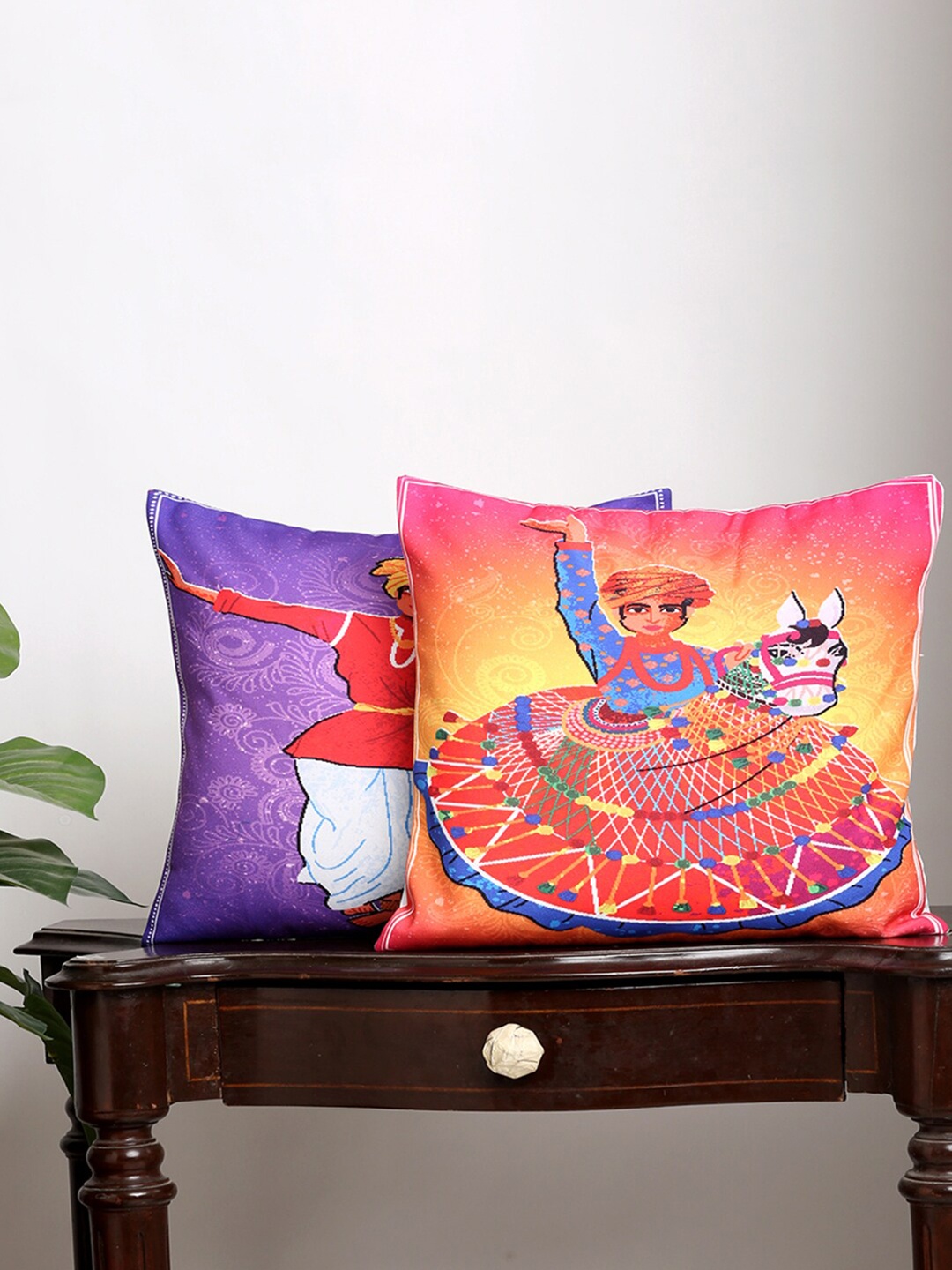 

Alina decor Set Of 2 Yellow & Purple Ethnic Motifs Square Cushion Covers
