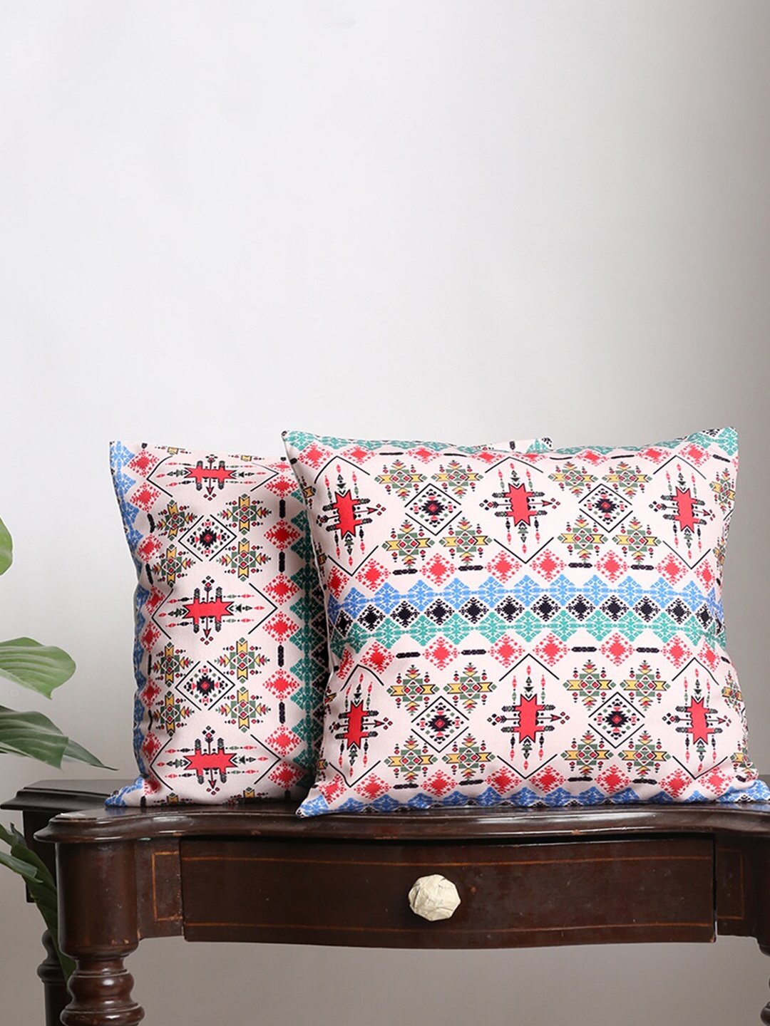 

Alina decor Set Of 2 Blue & Red Ethnic Motifs Square Cushion Covers
