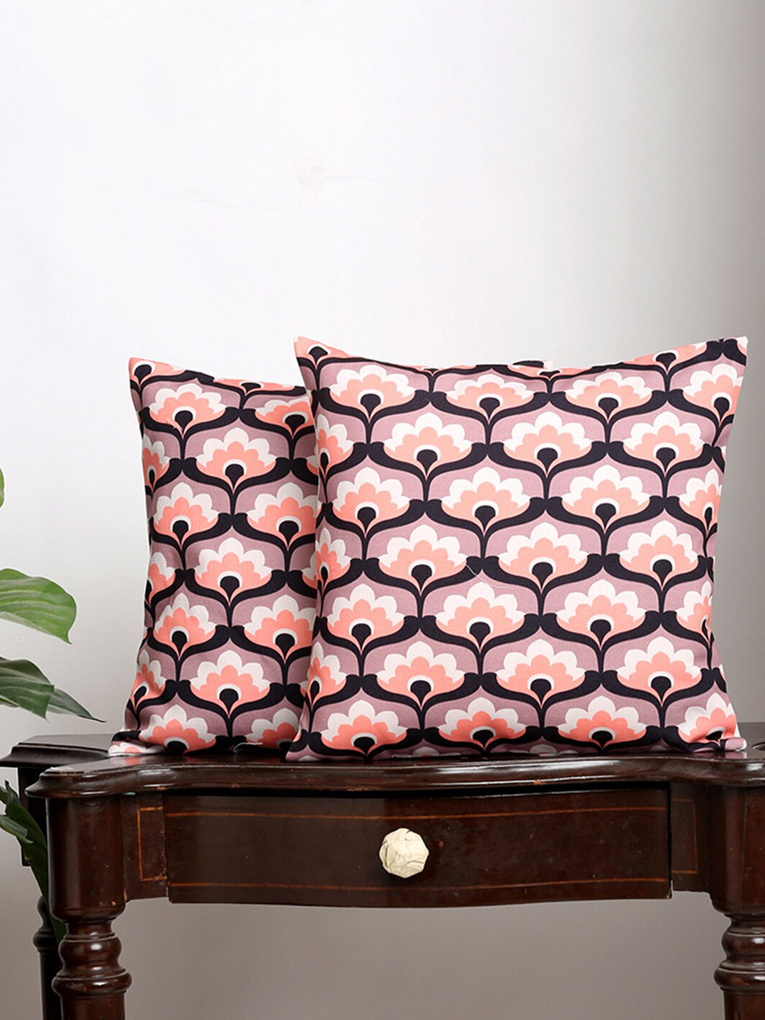 

Alina decor Set Of 2 Orange & Black Floral Square Cushion Covers