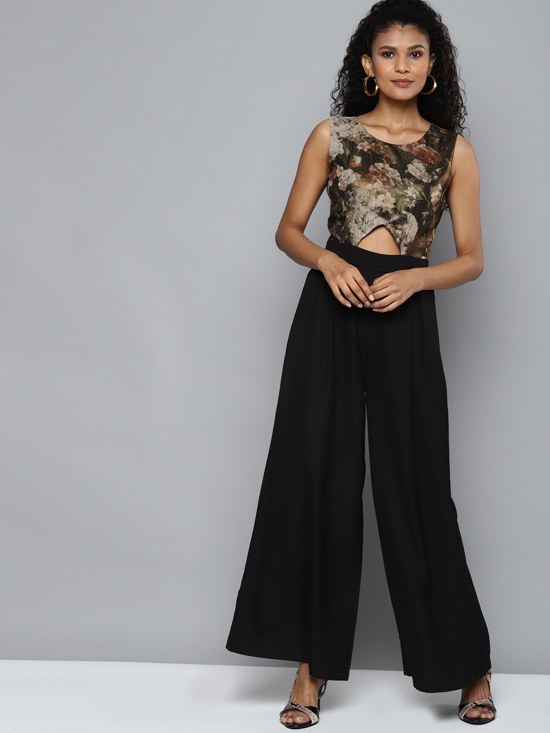 

SASSAFRAS Green & Black Floral Printed Flared Jumpsuit