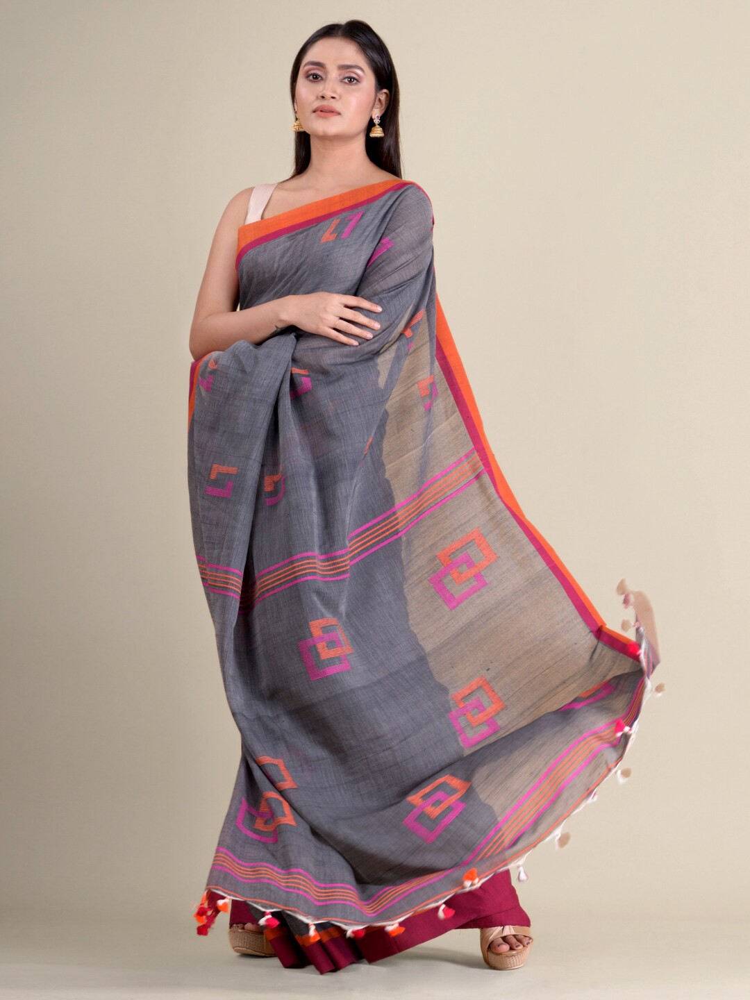 

Mitera Grey & Orange Pure Cotton Handloom Saree