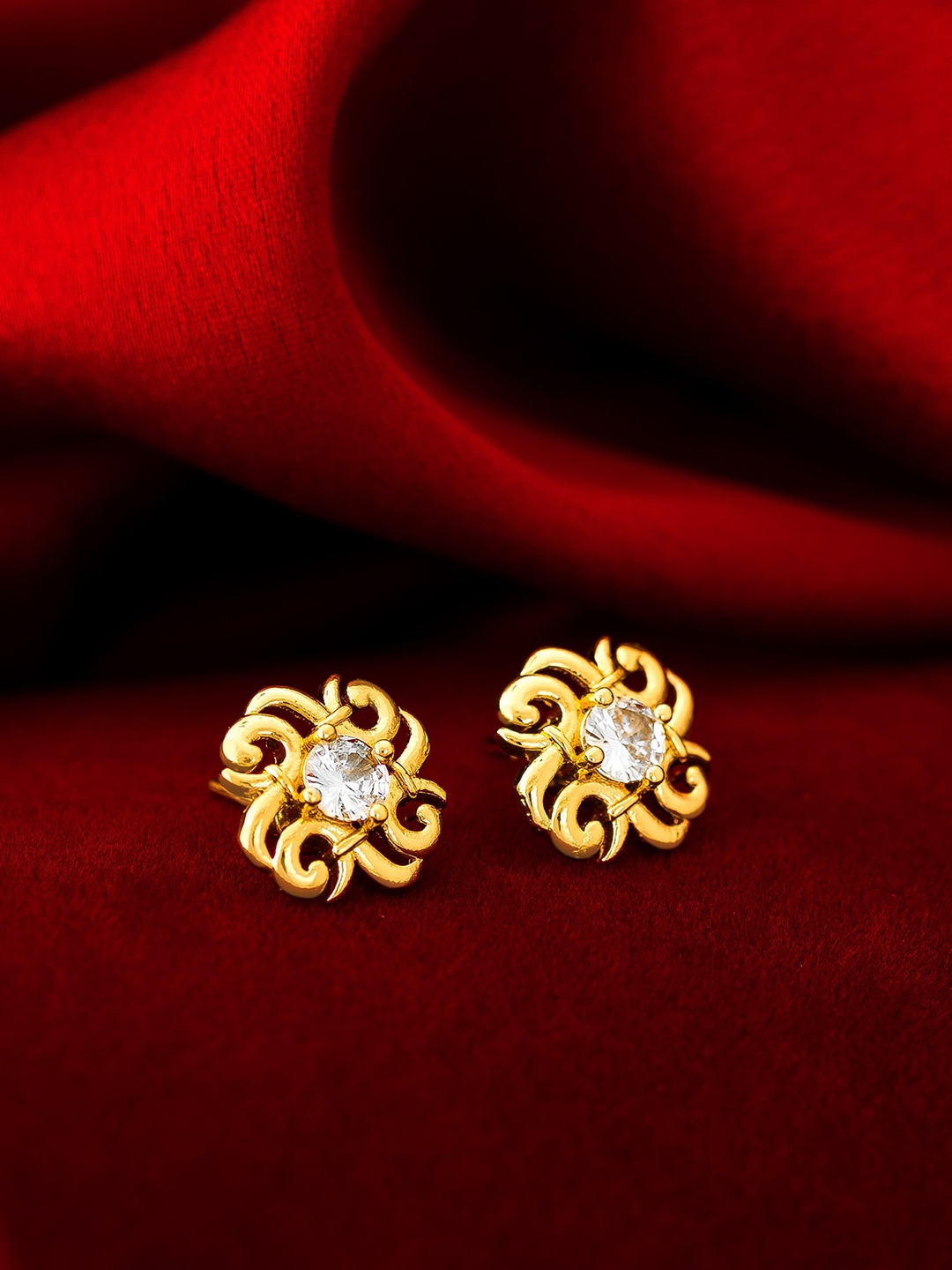 

aadita Gold Plated White Floral Studs Earrings