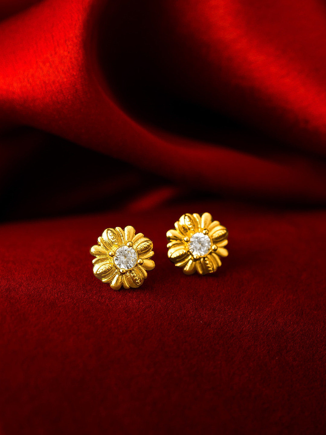 

aadita Gold Plated White Floral Studs Earrings