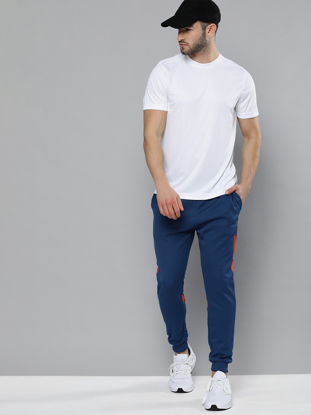 

HRX By Hrithik Roshan Men Blue & Orange Colourblock Training Joggers