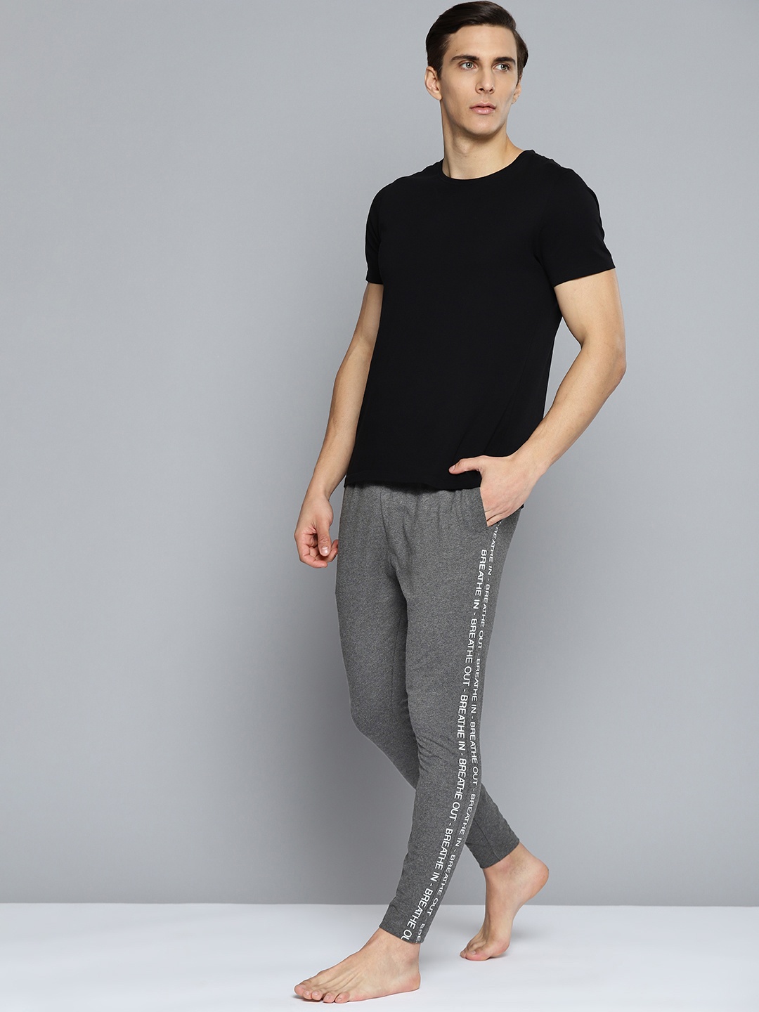 

HRX By Hrithik Roshan Yoga Men Anthra Melange Melange Solid Sustainable Track Pants, Charcoal