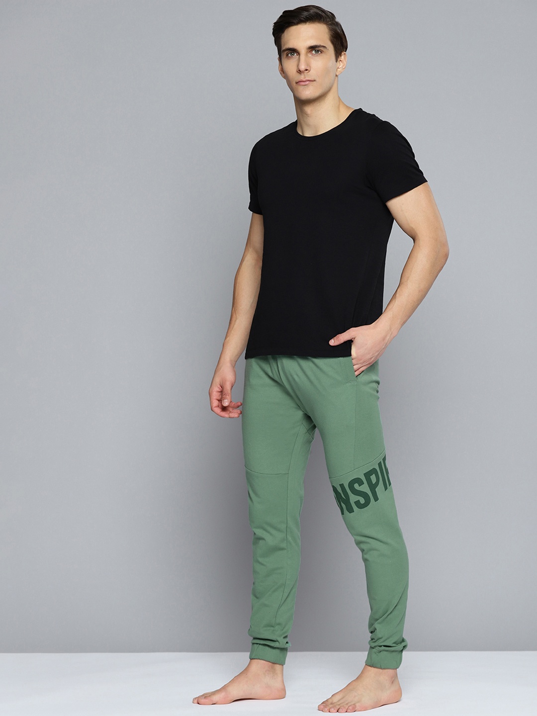 

HRX By Hrithik Roshan Yoga Men Brindle Rapid-Dry Typography Sustainable Track Pants, Green