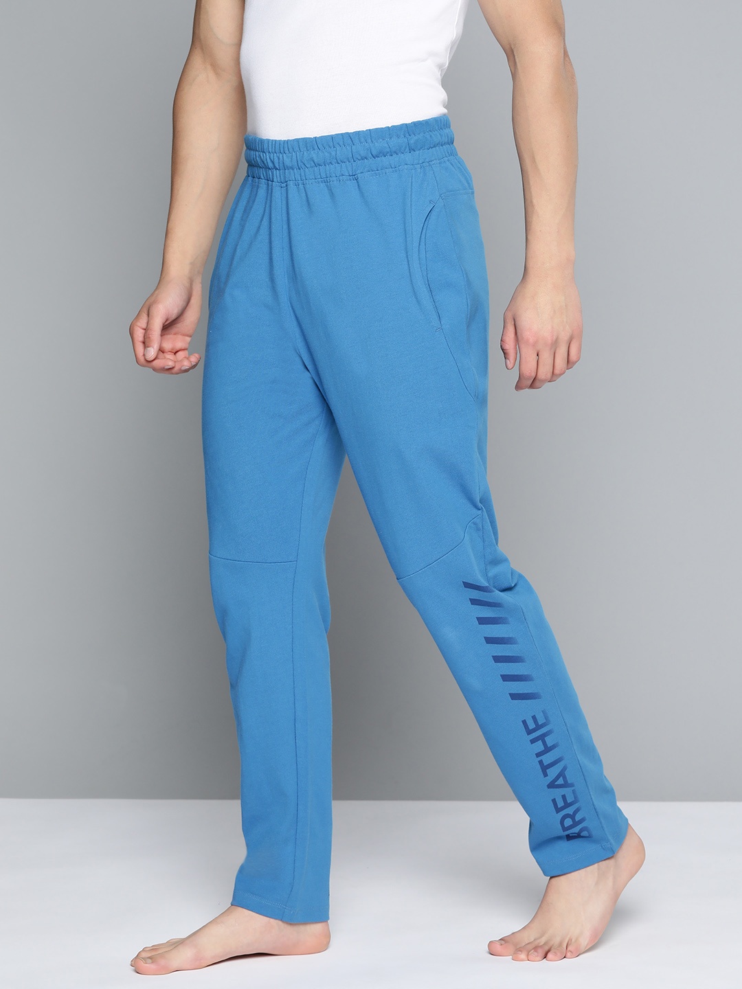 

HRX By Hrithik Roshan Yoga Men Rapid-Dry Typography Sustainable Track Pants, Blue