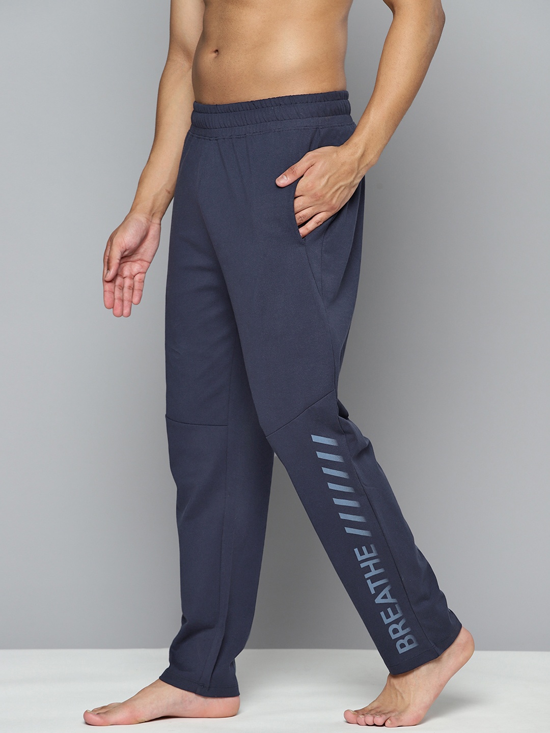 

HRX By Hrithik Roshan Yoga Men Rapid-Dry Typography Pure Cotton Sustainable Track Pants, Navy blue