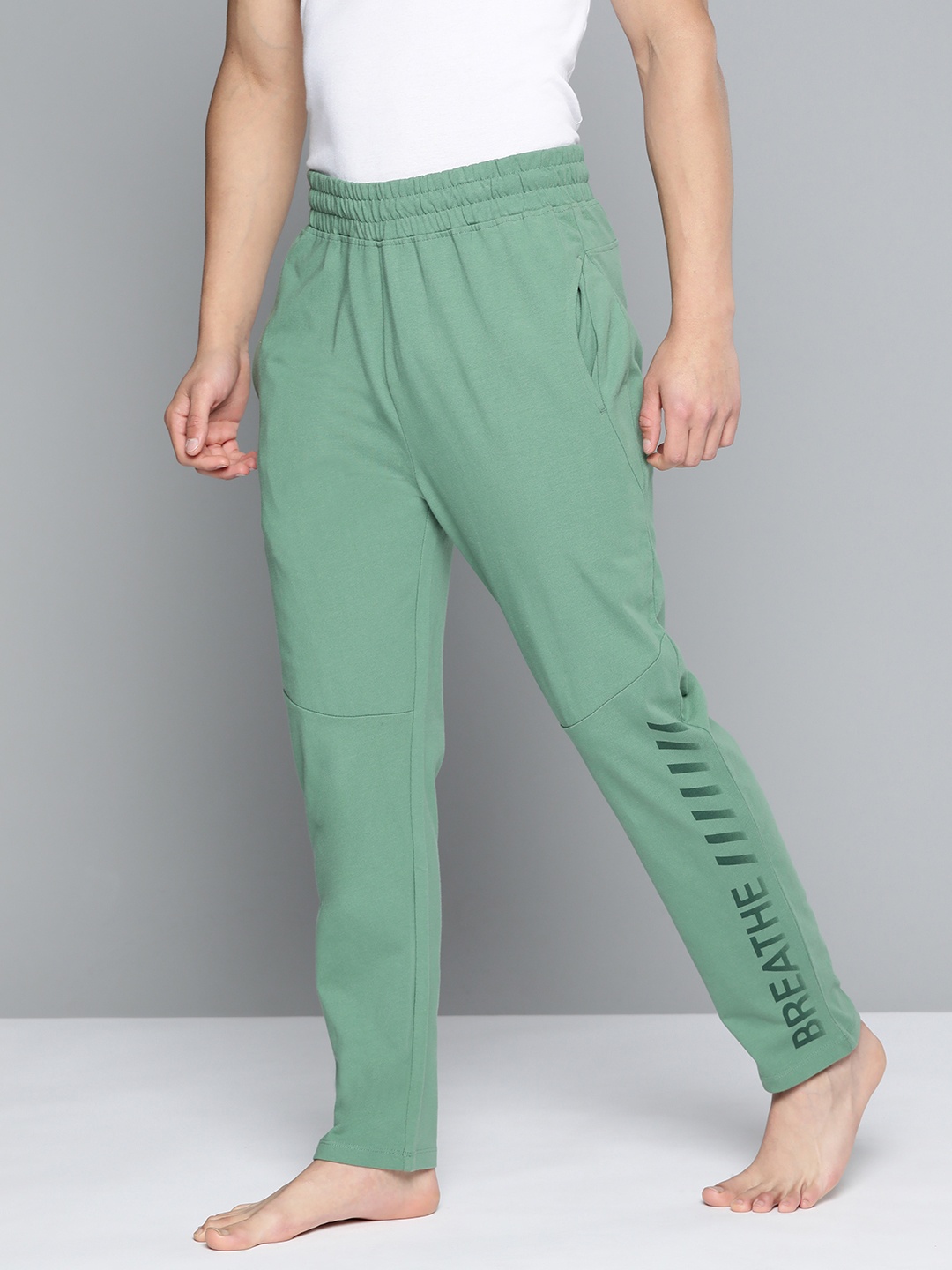 

HRX By Hrithik Roshan Yoga Men Rapid-Dry Typography Sustainable Track Pants, Green