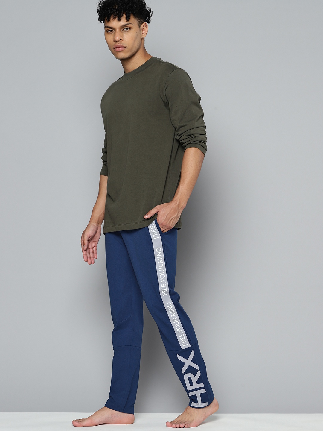 

HRX By Hrithik Roshan Yoga Men Melange Slim Fit Rapid-Dry Pure Cotton Sustainable Track Pants, Blue