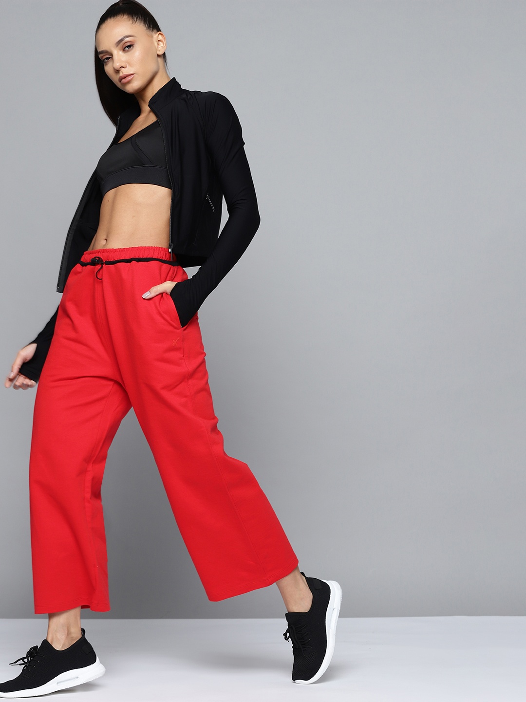 

HRX By Hrithik Roshan Lifestyle Women High Risk Red Cotton Bio-Wash Typography Track Pants