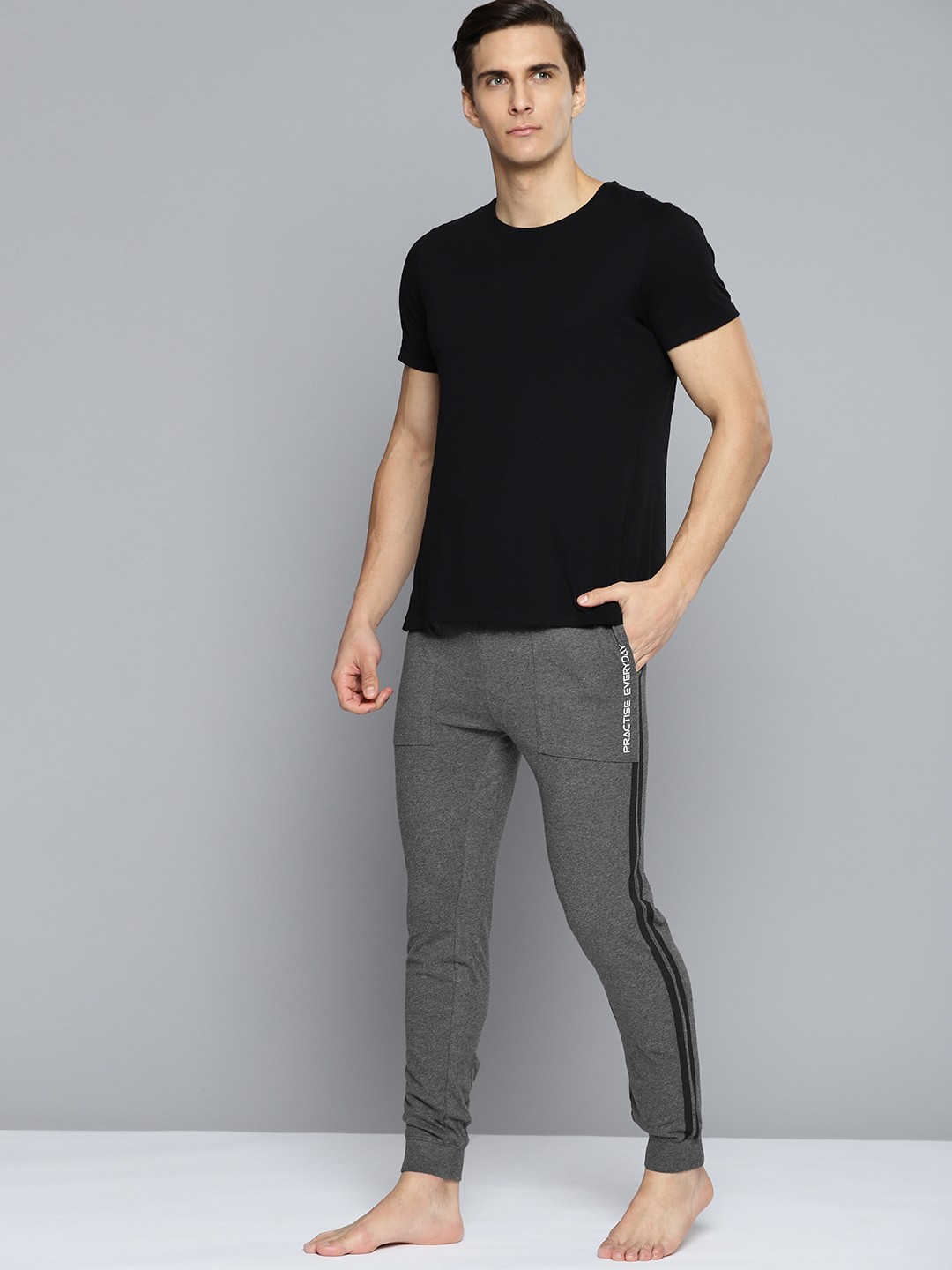

HRX By Hrithik Roshan Yoga Men Anthra Melange Pure CottonTypography Sustainable Track Pants, Charcoal