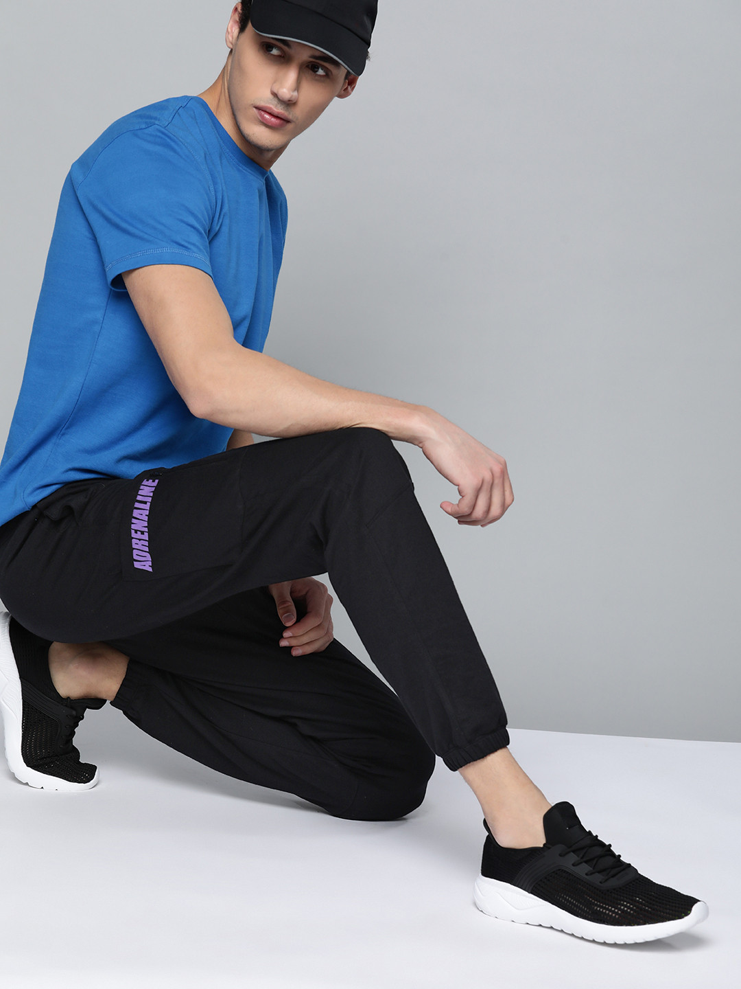 

HRX By Hrithik Roshan Lifestyle Men Jet Black Bio-Wash Typography Pure Cotton Joggers