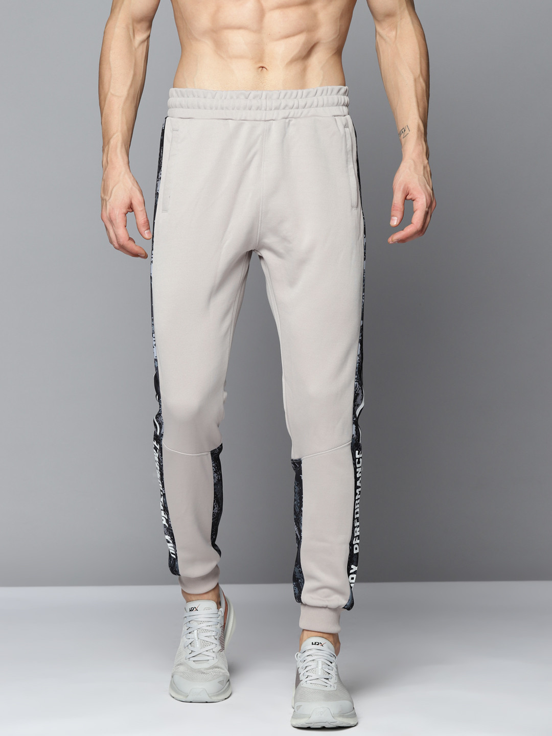 

HRX By Hrithik Roshan Training Men Wet Weather Camouflage Slim Fit Joggers, Taupe