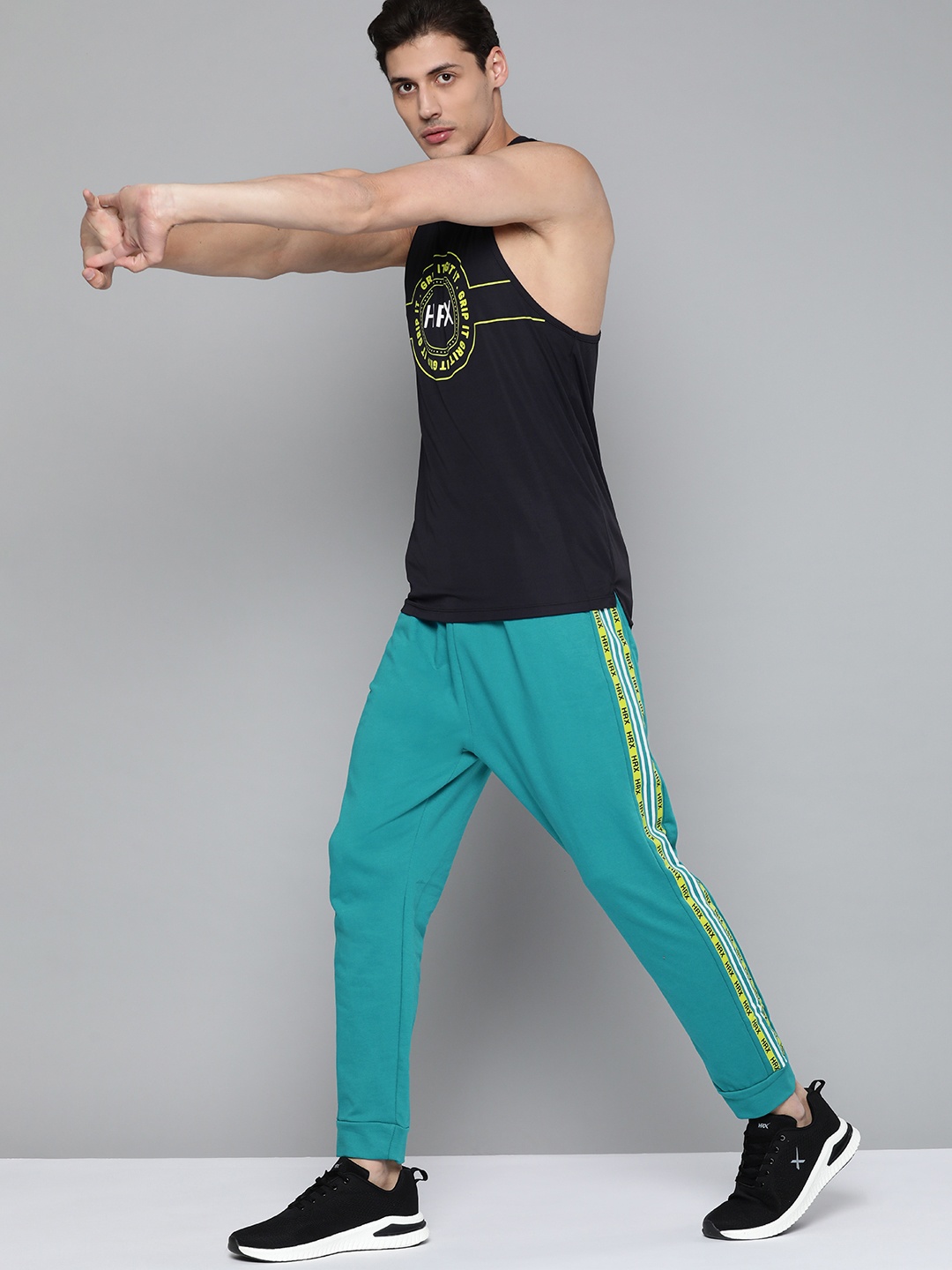 

HRX By Hrithik Roshan Training Men Virdigiris Rapid-Dry Brand Logo Print Joggers, Teal