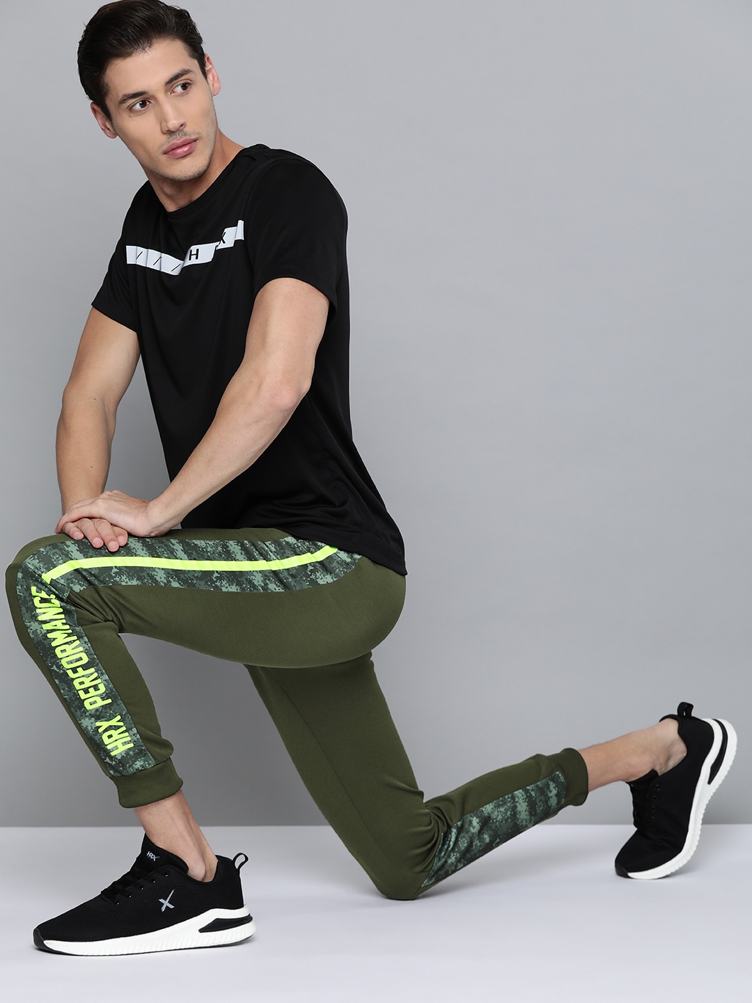 

HRX By Hrithik Roshan Training Men Kombu Green Camouflage Track Pants, Olive