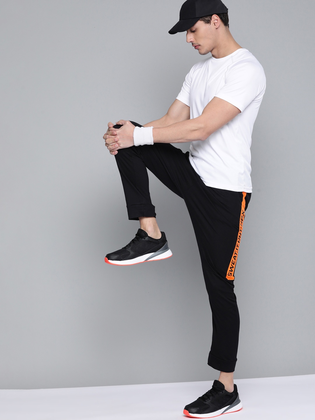 

HRX By Hrithik Roshan Training Men Jet Black Rapid-Dry Typography Track Pants
