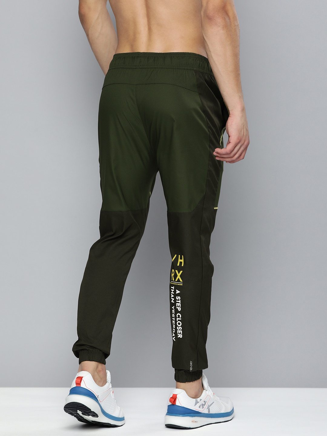

HRX By Hrithik Roshan Training Men Kombu Green Rapid-Dry colourblock Track Pants, Olive
