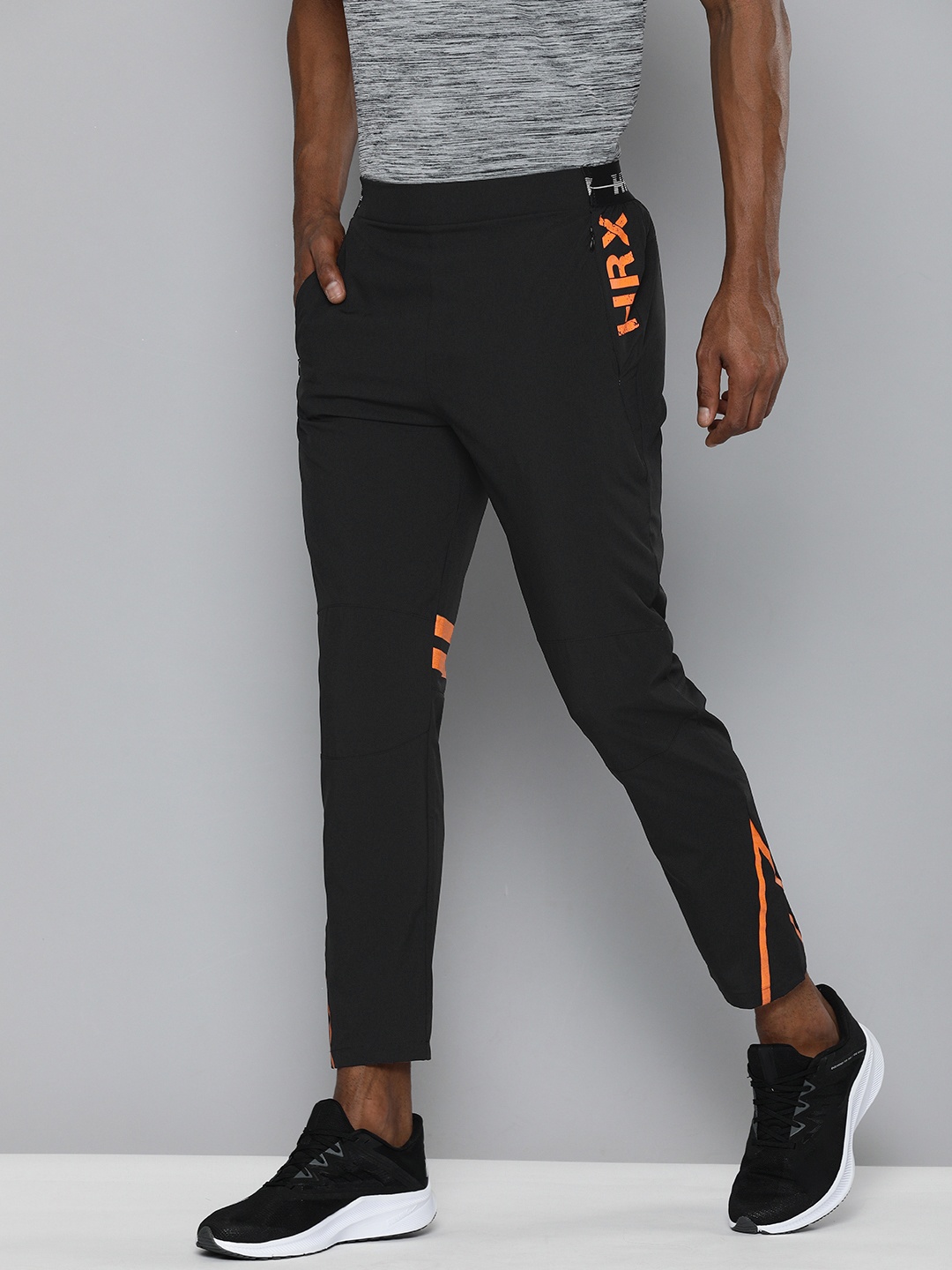 

HRX By Hrithik Roshan Men Black Tapered Fit Brand Carrier Rapid-Dry Training Track Pants