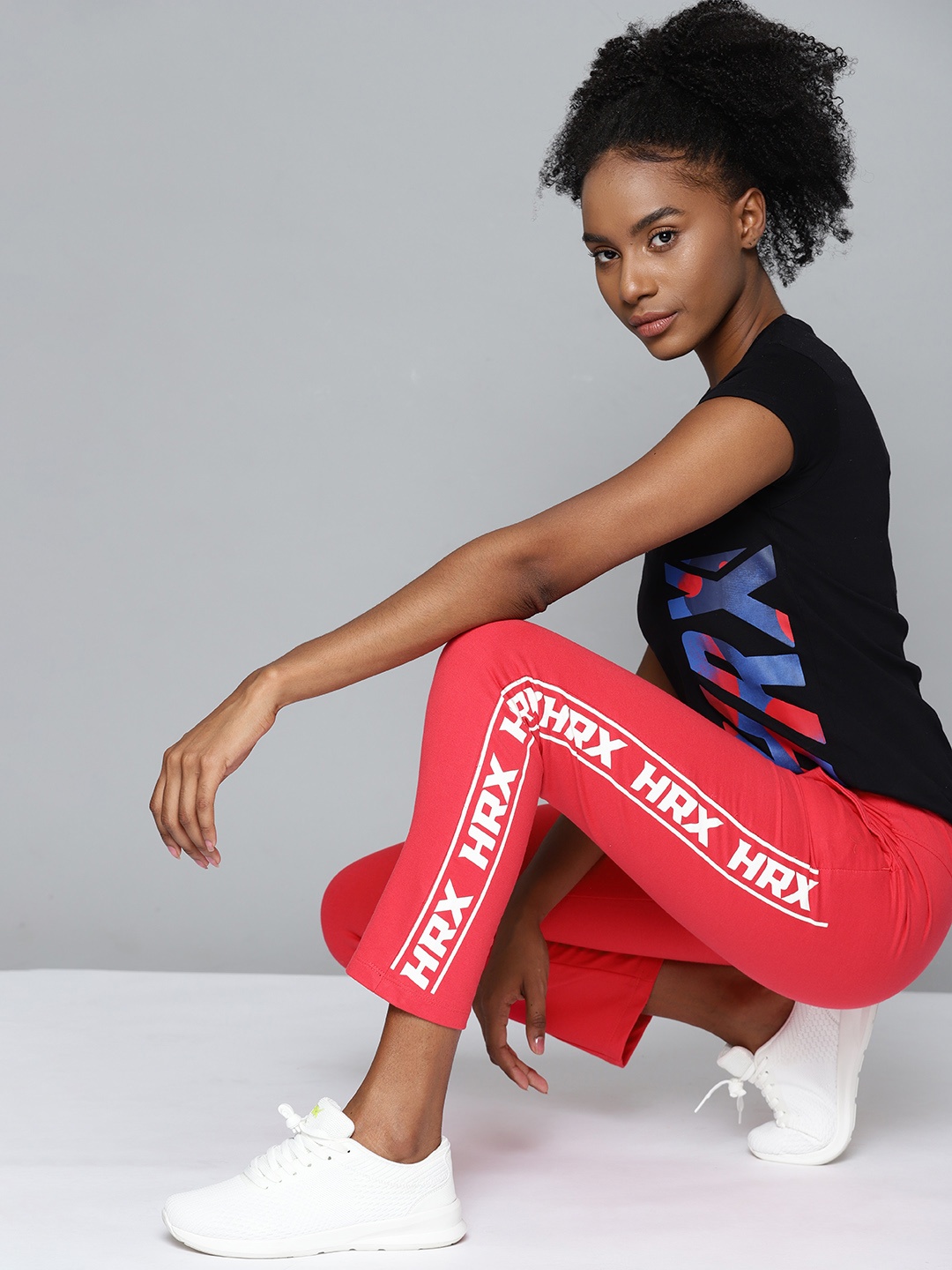 

HRX By Hrithik Roshan Lifestyle Women Hothouse Coral Pink Bio-Wash Typography Track Pants