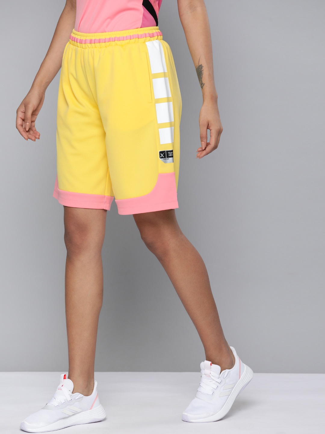 

HRX By Hrithik Roshan Basketball Women Aspen Gold Rapid-Dry Colourblock Shorts, Yellow