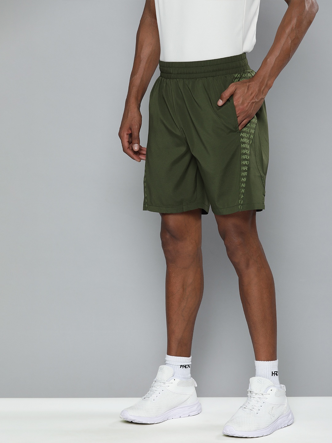 

HRX By Hrithik Roshan Training Men Olive Green Rapid-Dry Brand Carrier Shorts