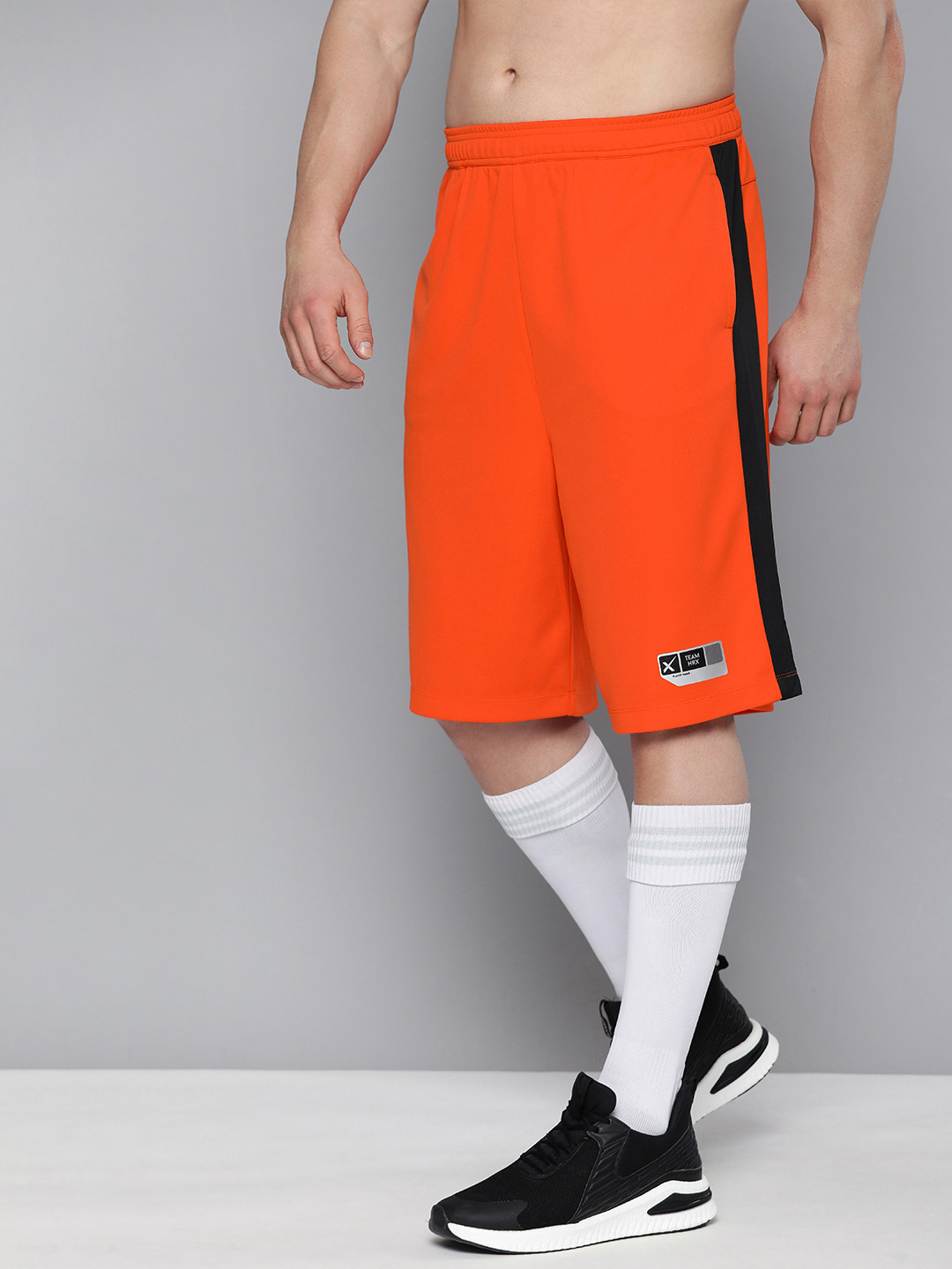 

HRX By Hrithik Roshan Basketball Men Orange & Black Colourblocked Rapid-Dry Shorts