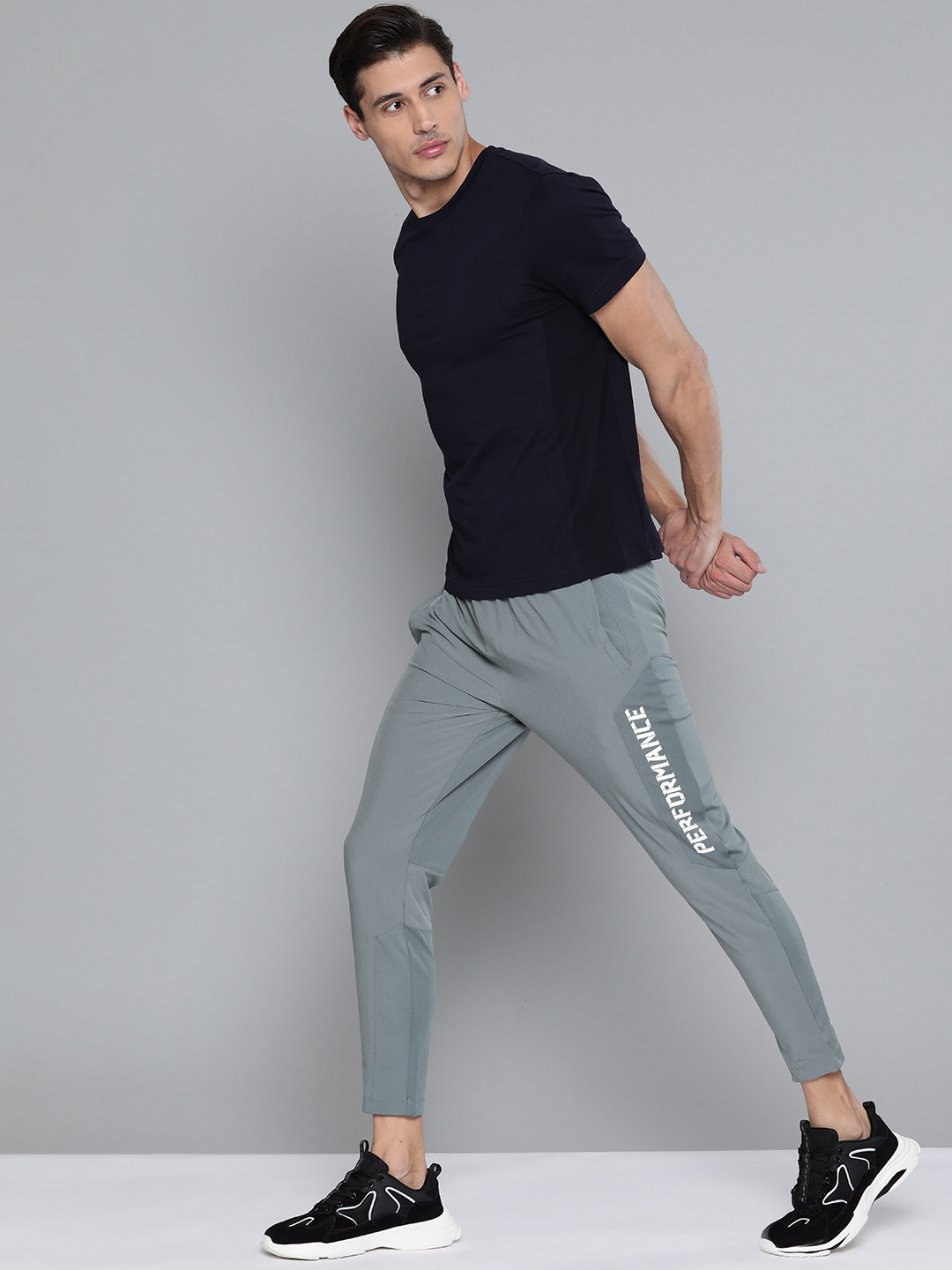 

HRX By Hrithik Roshan Training Men pewter Rapid-Dry Brand Carrier Track Pants, Grey