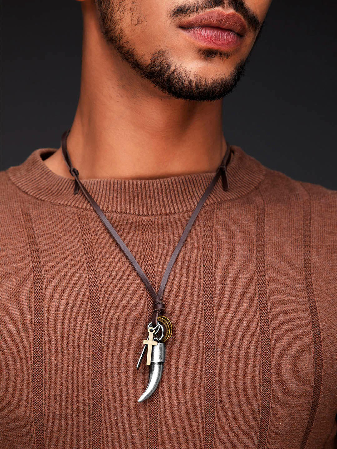 

Roadster Men Brown & Gold-Toned Tooth Pendant Tribal Chain