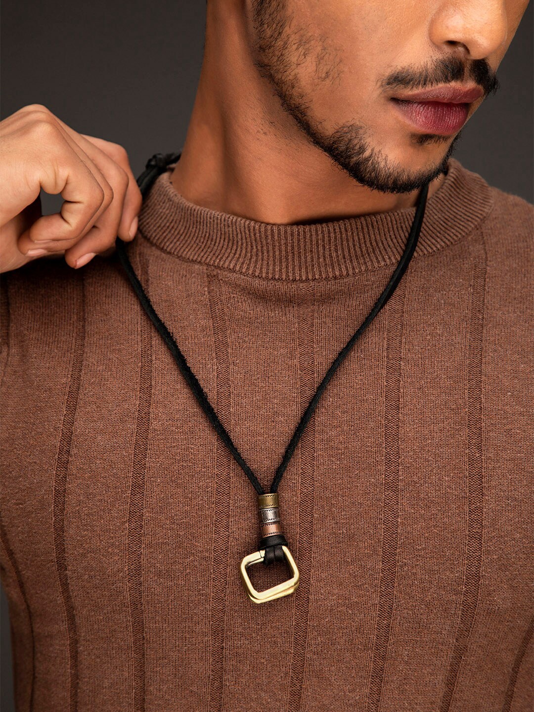 

Roadster Men Black & Gold-Toned Roadster Pendant Necklace With Adjustable Leather Cord Chain