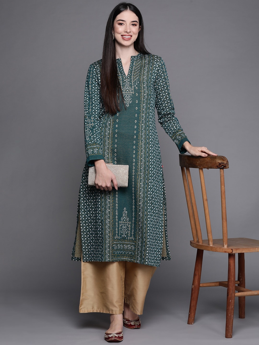 

Biba Women Teal Green & White Ethnic Motifs Straight Winter Kurta