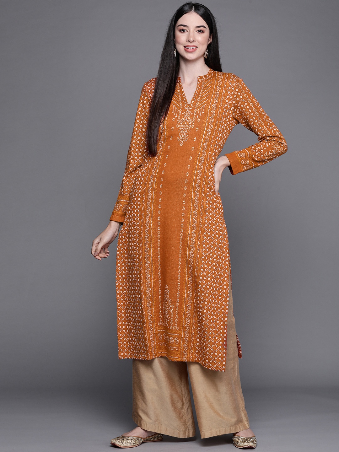 

Biba Women Rust Orange & Off-White Woven-Design Winter Straight Kurta