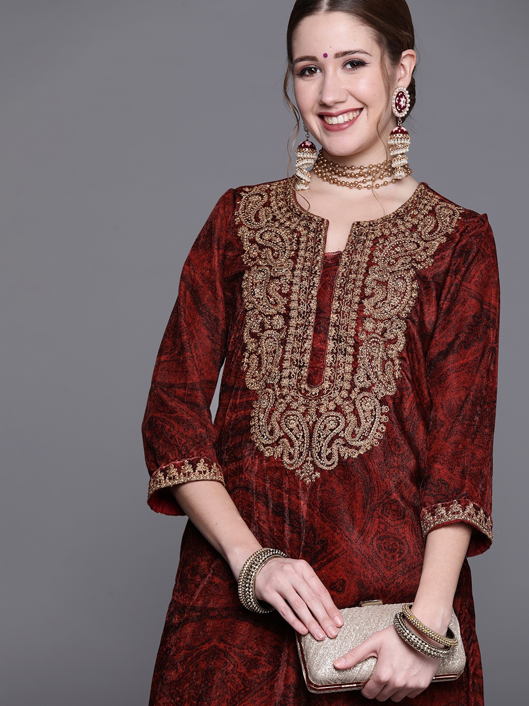 

Biba Women Maroon & Golden Ethnic Motifs Embroidered Winter Kurta