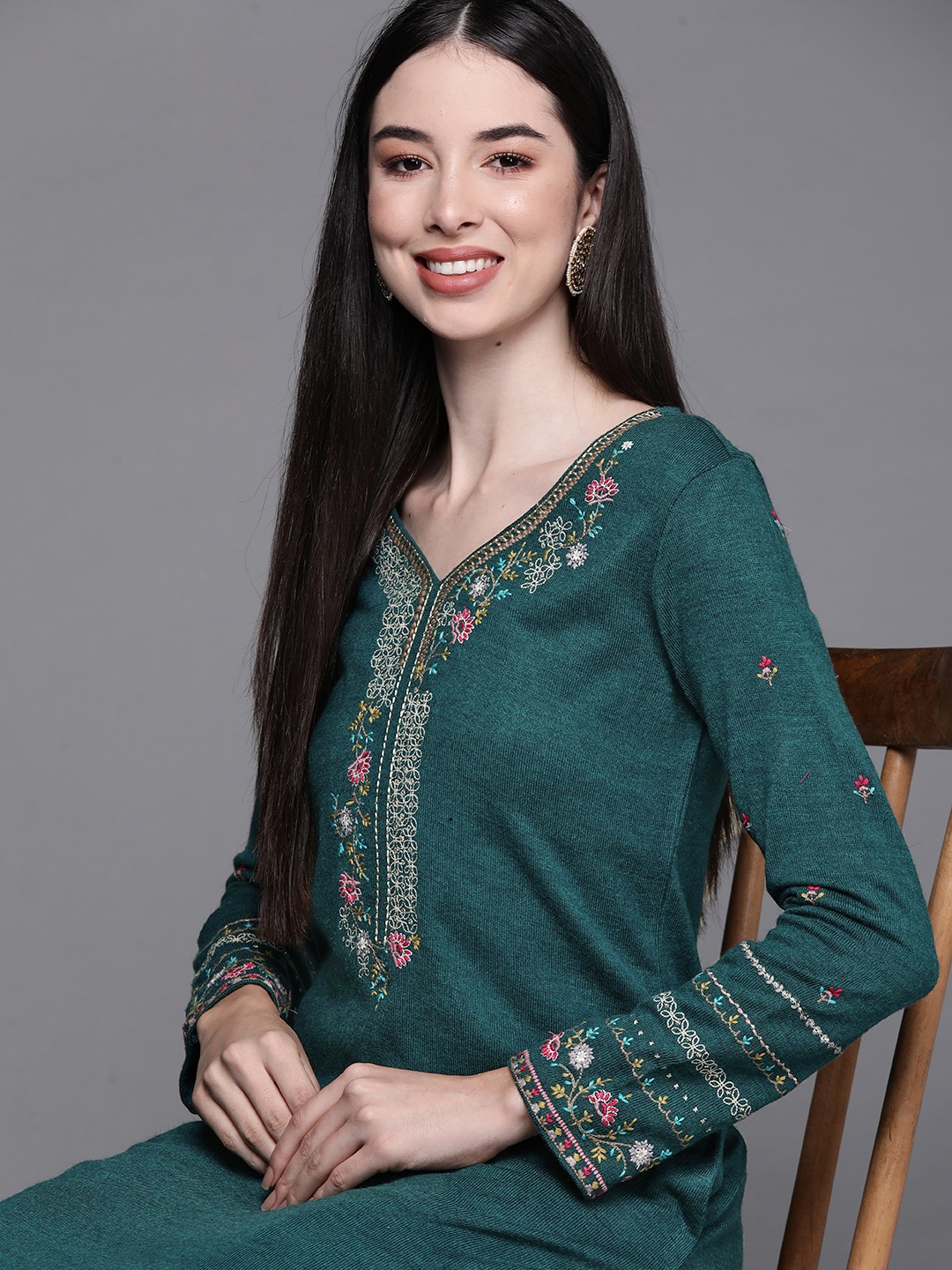 

Biba Women Teal Green Yoke Embroidered Asymmetric Hem Winter Kurta