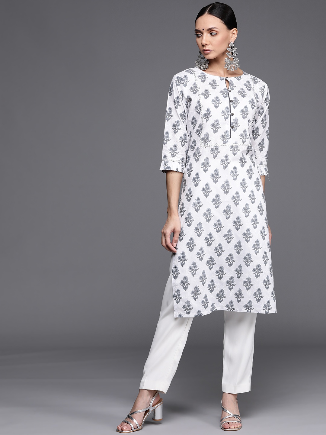 

Libas Women White Floral Printed Monochrome Kurta