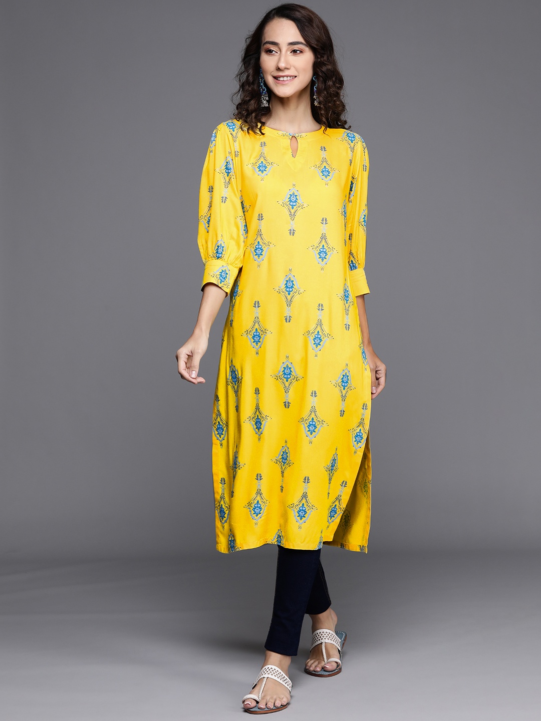 

Libas Women Yellow Floral Printed Keyhole Neck Puffed Sleeves Kurta