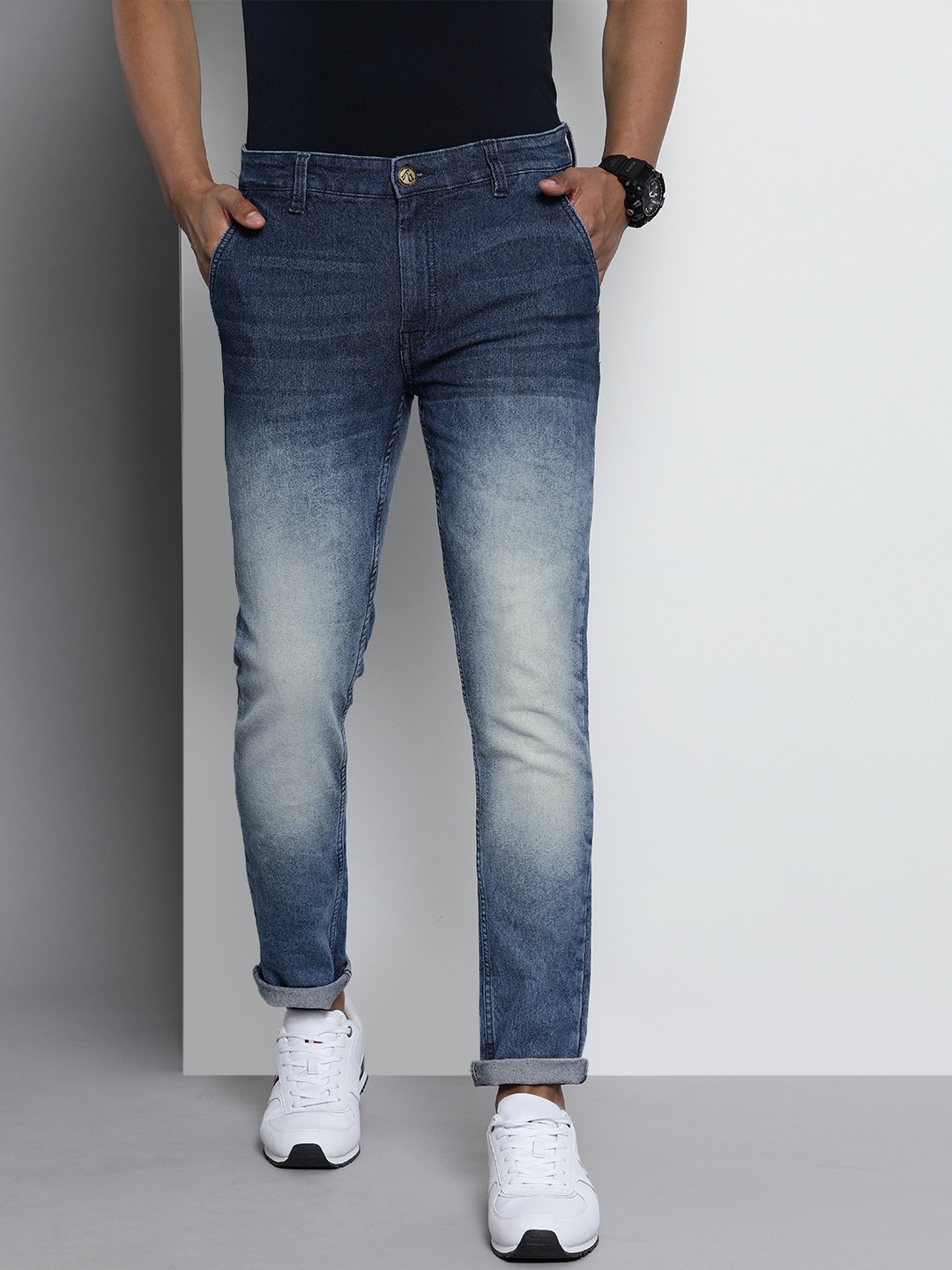 

The Indian Garage Co Men Blue Slim Fit Mildly Distressed Light Fade Stretchable Jeans