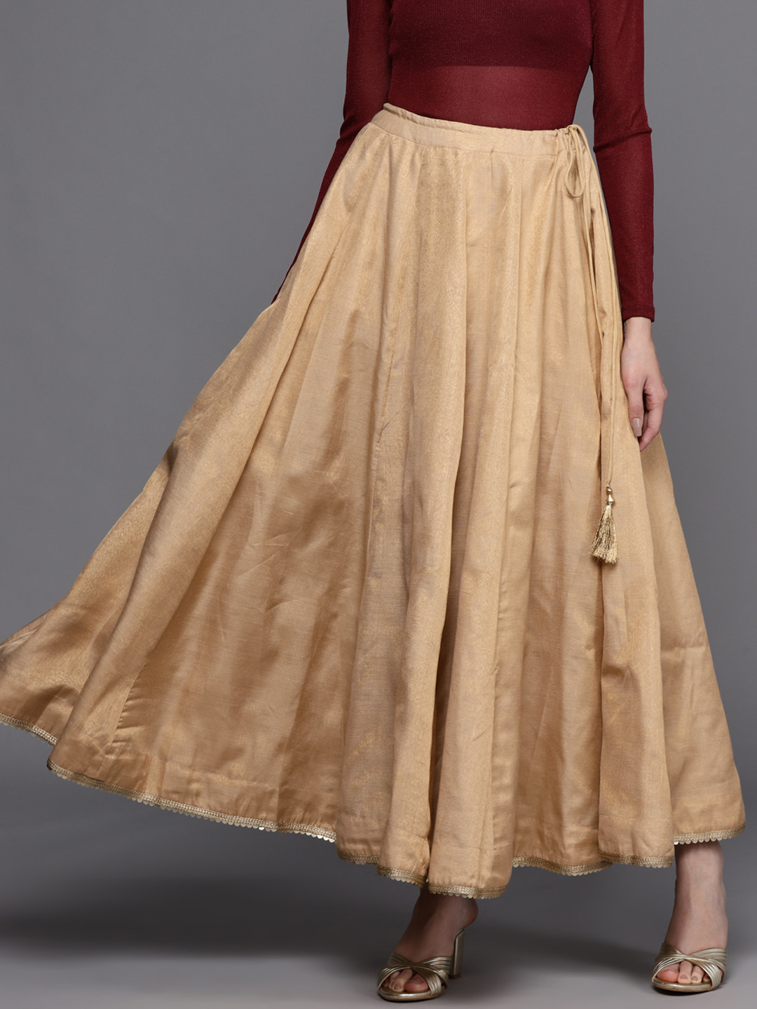 

Biba Women Gold Solid Flared Skirt