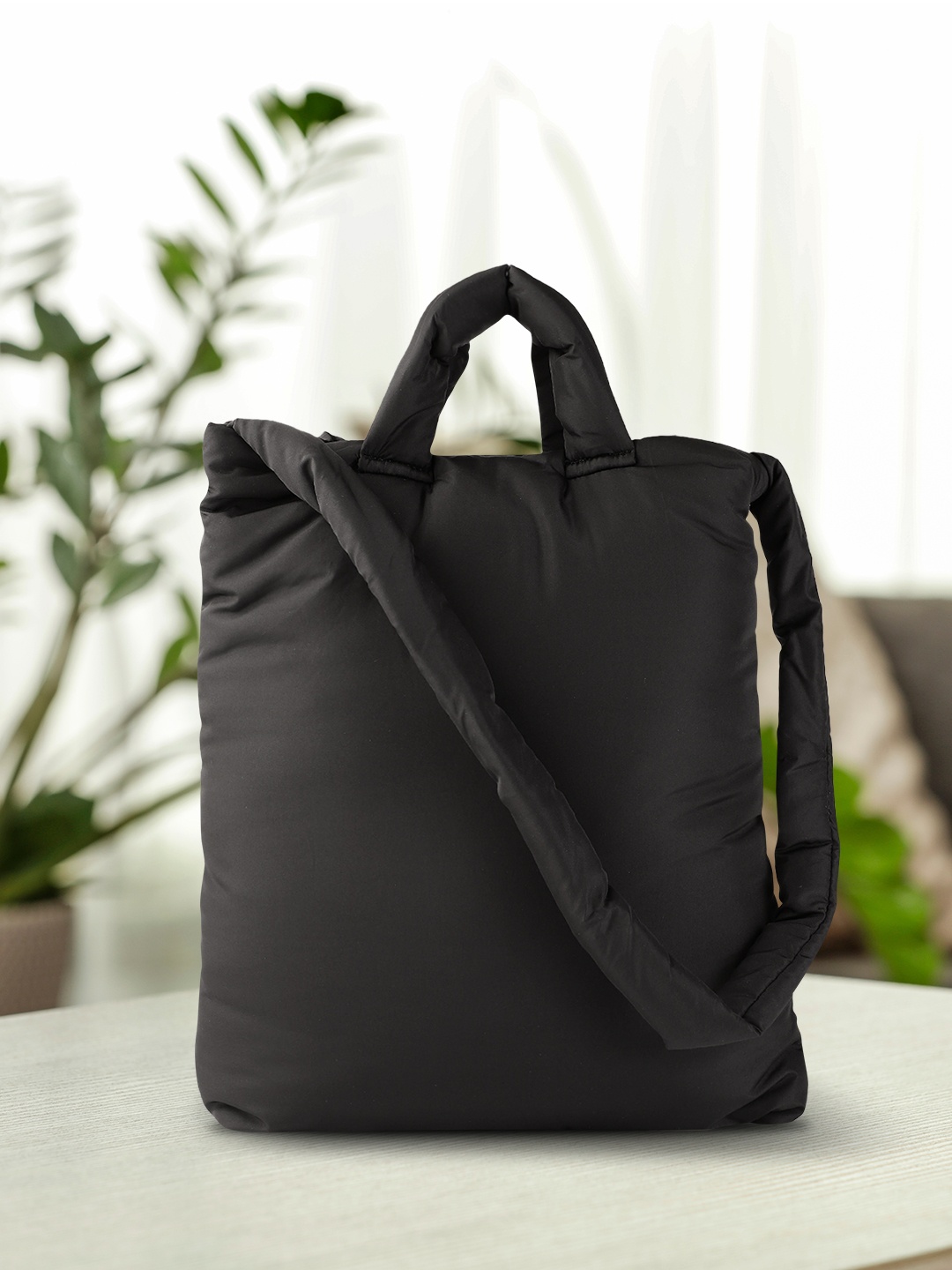 

MANGO Black Solid Soft Padded Handheld Bag