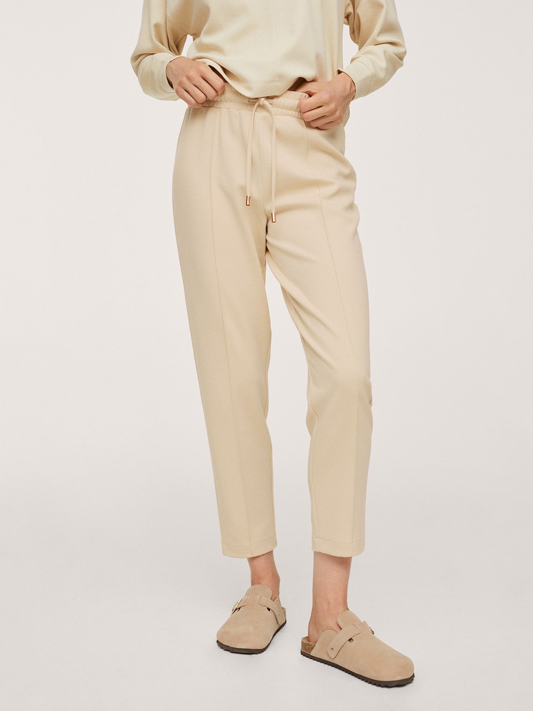 

MANGO Women Cream-Coloured Solid Regular Trousers